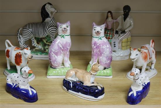 Nine Staffordshire and other pottery figures, 19th/20th century tallest 22.5cm